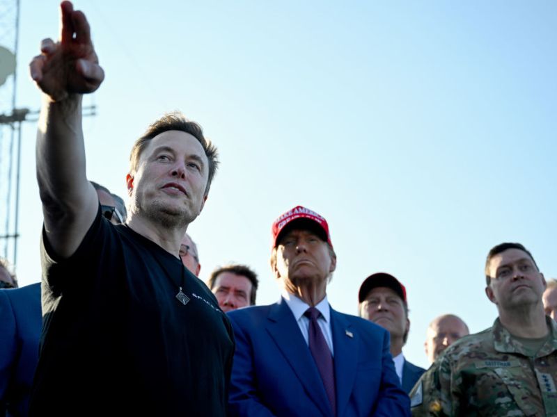 Self-proclaimed "First Buddy" Elon Musk gestures while discussing the sixth Starship test launch with President-elect Donald Trump at Starbase in Boca Chica, Texas. To the right of Trump is Gen. Chance Saltzman, Chief of space operations for the U.S. Space Force.