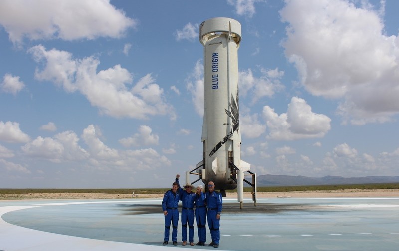 NS-16 crew and booster