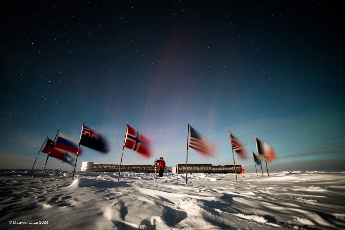National flags raised during a ceremony at Amundsen-Scott South Pole Station. Image courtesy of Manwei Chan