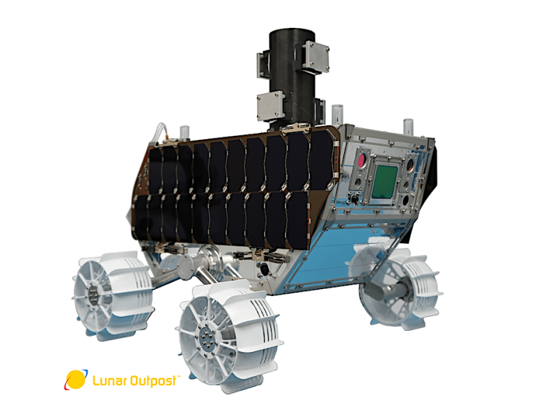 The Lunar Vertex rover at Lunar Outpost prior to shipment to APL. The black cylinder on top is a mass model for the APL Vector Magnetometer–Rover (VMR). The VMR flight model instrument will be installed at APL. The rover's solar arrays are shown in their stowed (folded down) configuration. Once on the Moon, the solar arrays will be deployed to a horizontal position. Photo credit: Lunar Outpost.